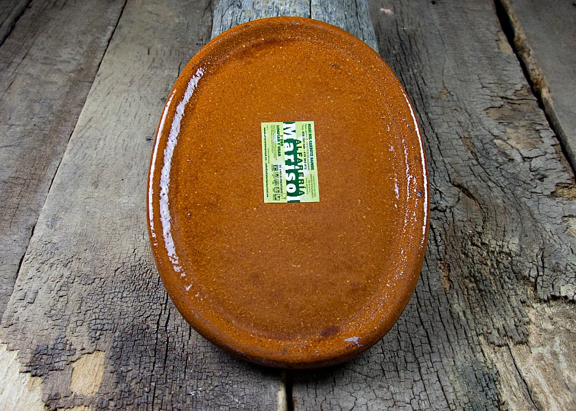 Oval-shaped clay dish special por Stone-grilled meat