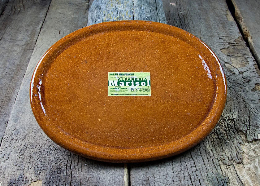 Oval-shaped clay dish special por Stone-grilled meat