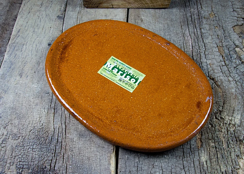 Oval-shaped clay dish special por Stone-grilled meat