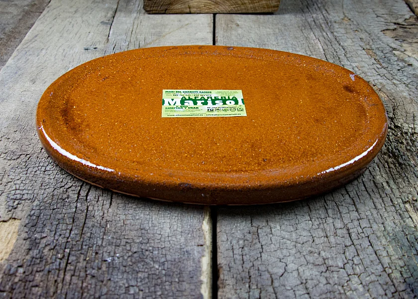 Plato de barro ovalado especial para carnes a la piedra