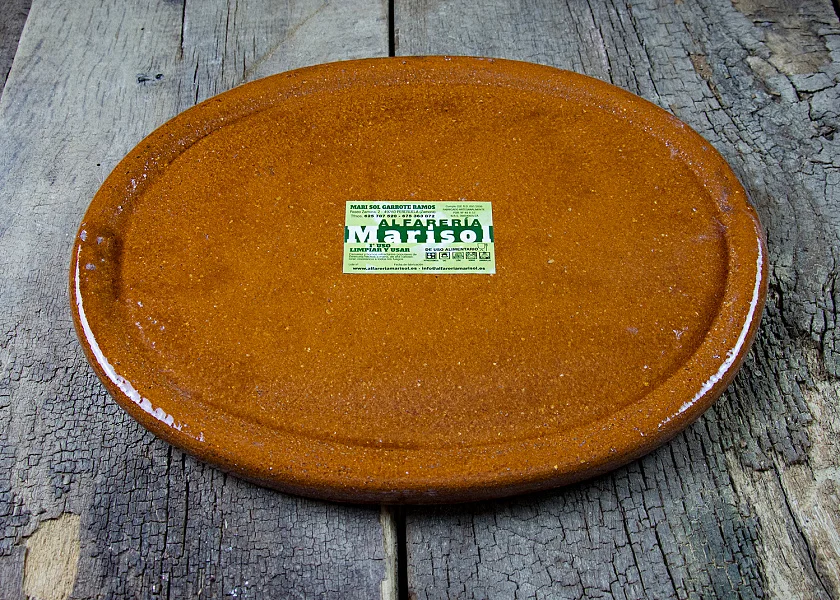 Plato de barro ovalado especial para carnes a la piedra