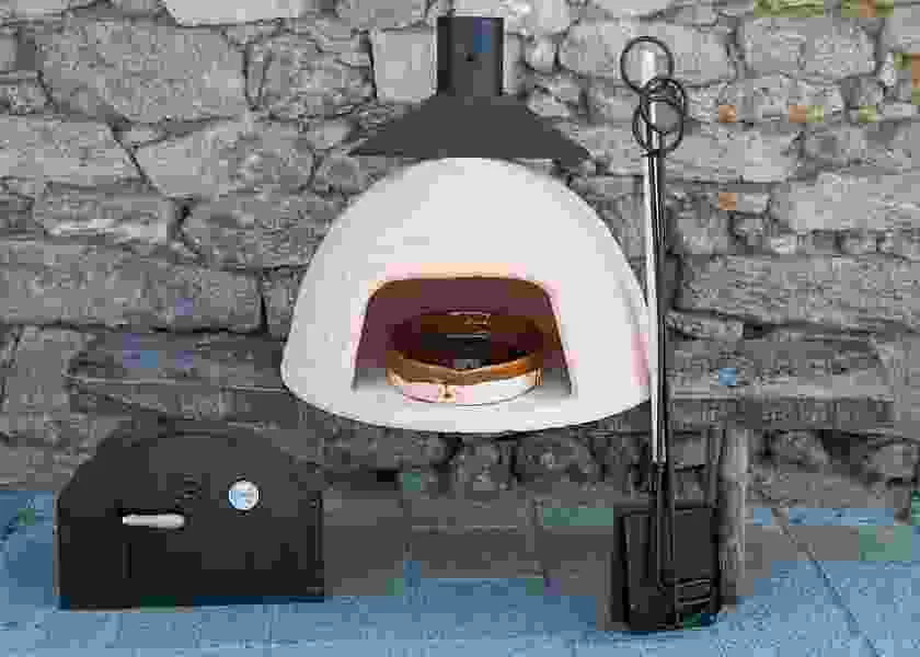 Set of oven, accessories and gift of oval-shaped flat roaster 40 cm