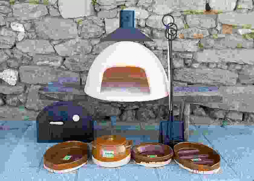 Set of oven, accessories, roasters, pan and paella pot