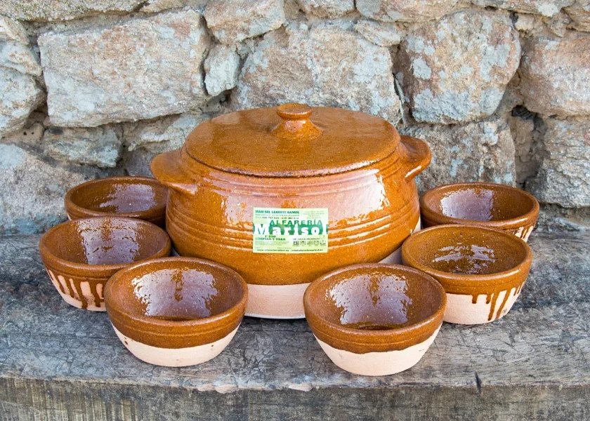 Set of pan and clay pots