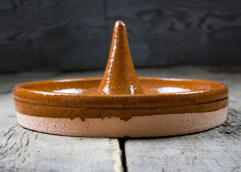 Set of roasters, dishes and stew pot.